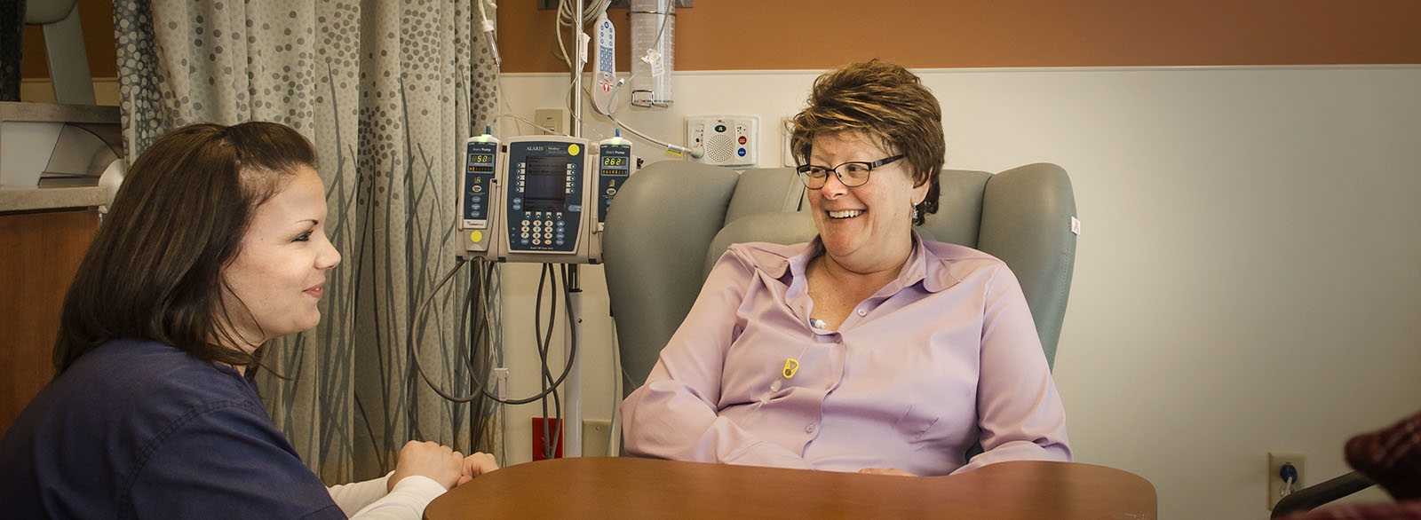 Cancer Center nurse with chemotherapy patient