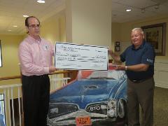 Rick_Caldwell_2018 Raffle Winner Rick Caldwell accepts his check as the 2018 Hospice Concert Raffle Winner!