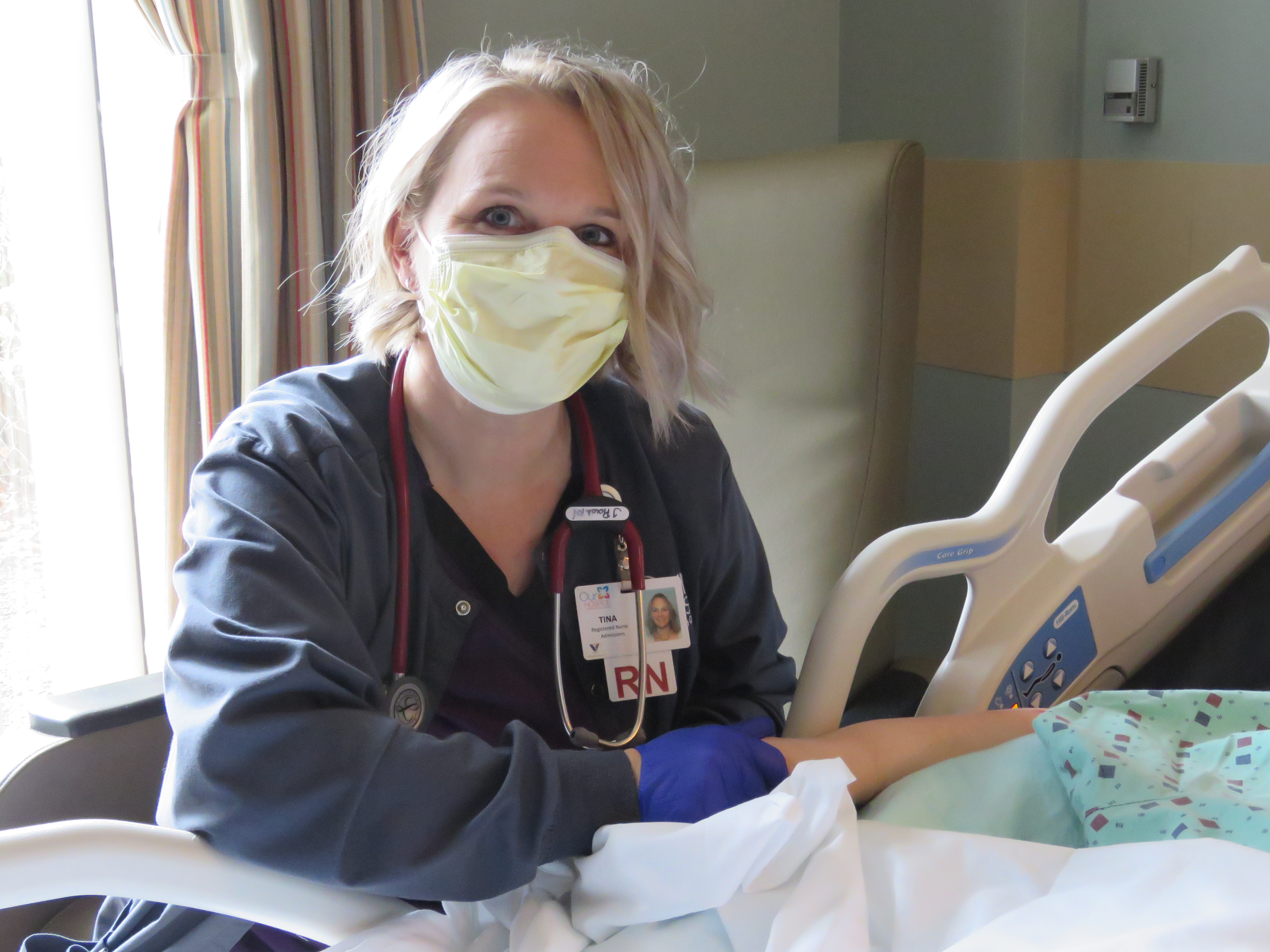 Nurse Caring for Patient